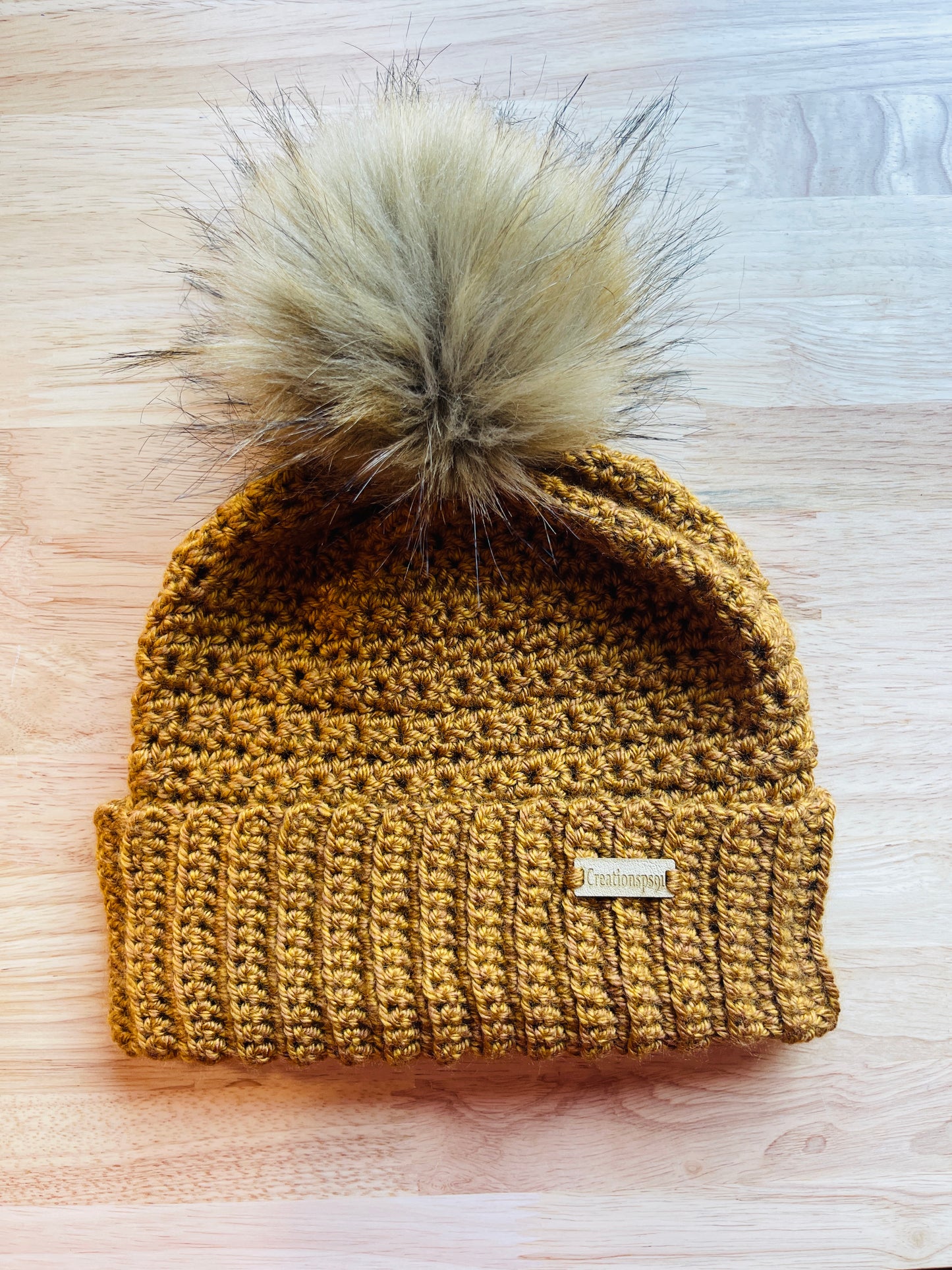 Handmade women beanie with detachable pom pom gold color