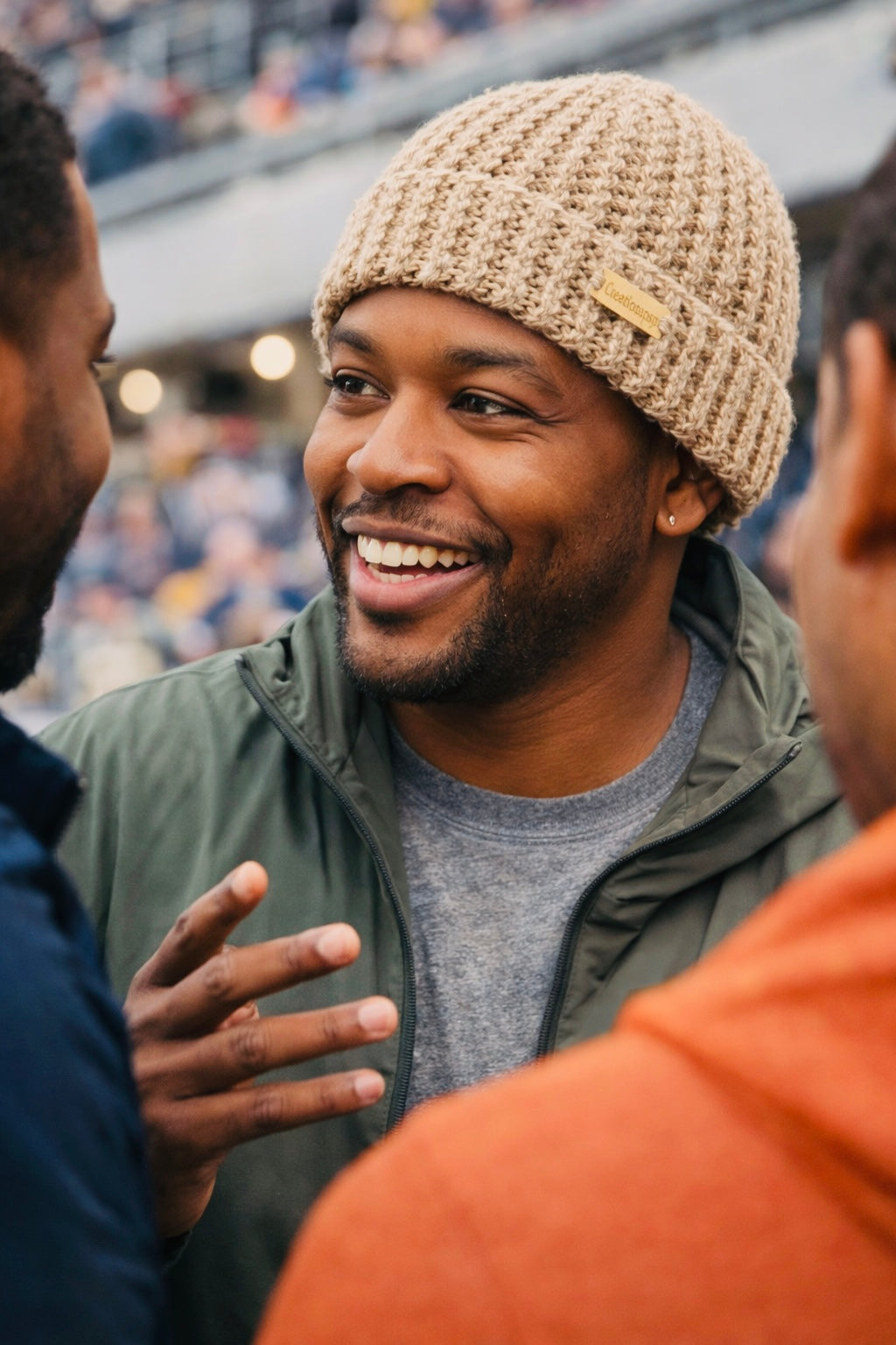 Man with friends wear handmade crochet beanie